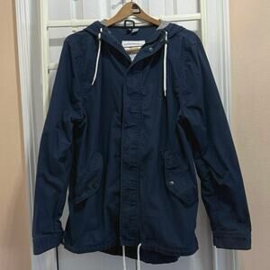 HM Divided mens size L military jacket w/ hood. Snaps over zipper. Dark blue